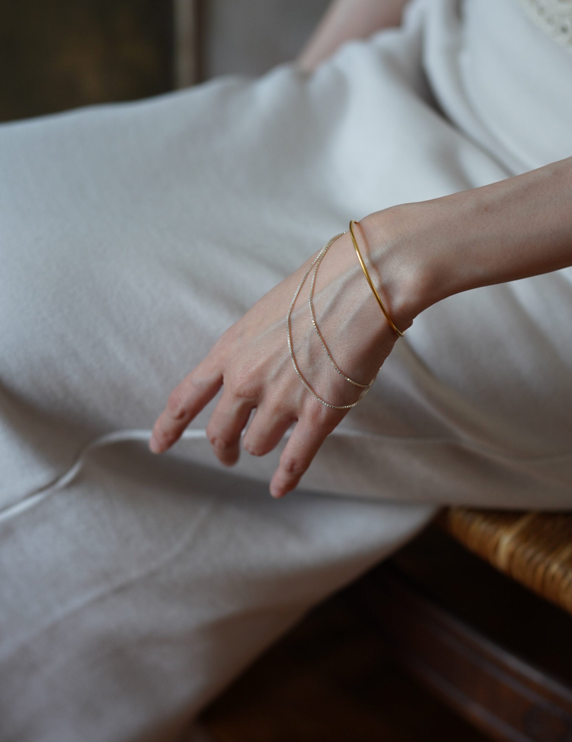 CURRENTS 流蘇手環・金銀混色