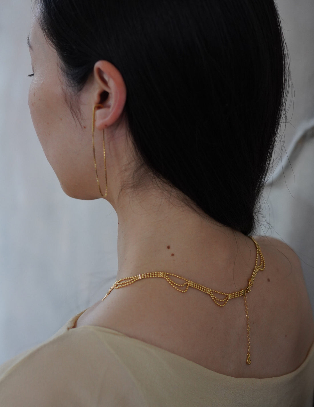 CURRENTS 長鍊耳環・金